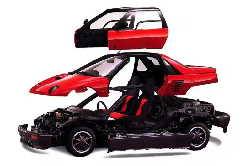 Mazda Autozam AZ-1: маленький двухместный спортивный автомобиль с крыльями чайки