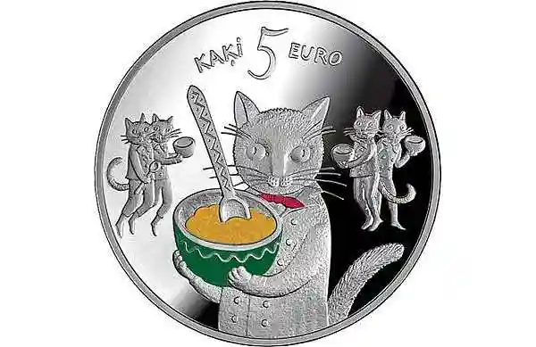 Серебряная монета с котиками